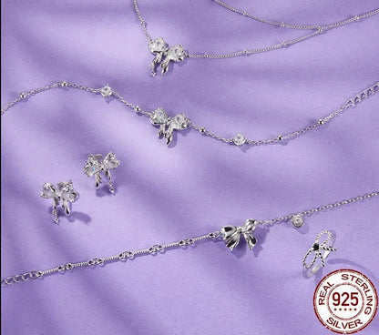 925 Sterling Silver Bow Earrings